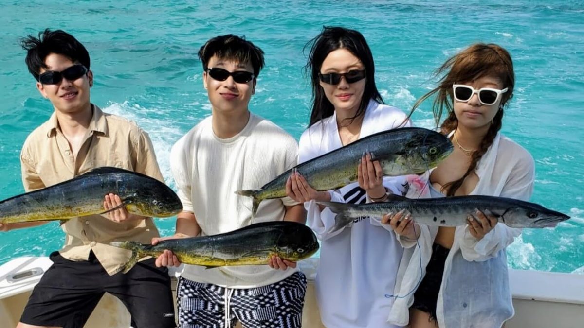 Friends with mahi-mahi and barracuda catch